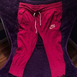 Nike pink sweatpants.
